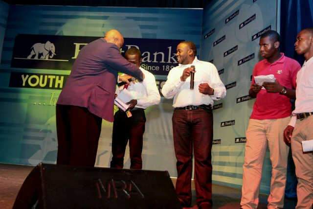 Joshua gets adopted for mentorship by American celebrity speaker and singer, Dr Willie Jolley in 2013